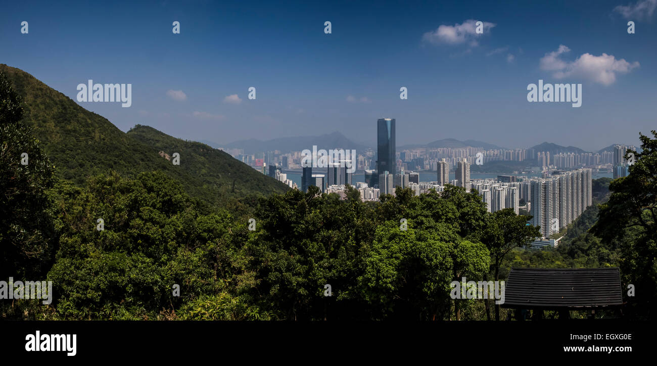 A view over Tai Koo Shing taken from a country park on Hong Kong island looking out over the harbour and Kowloon on a clear day Stock Photo