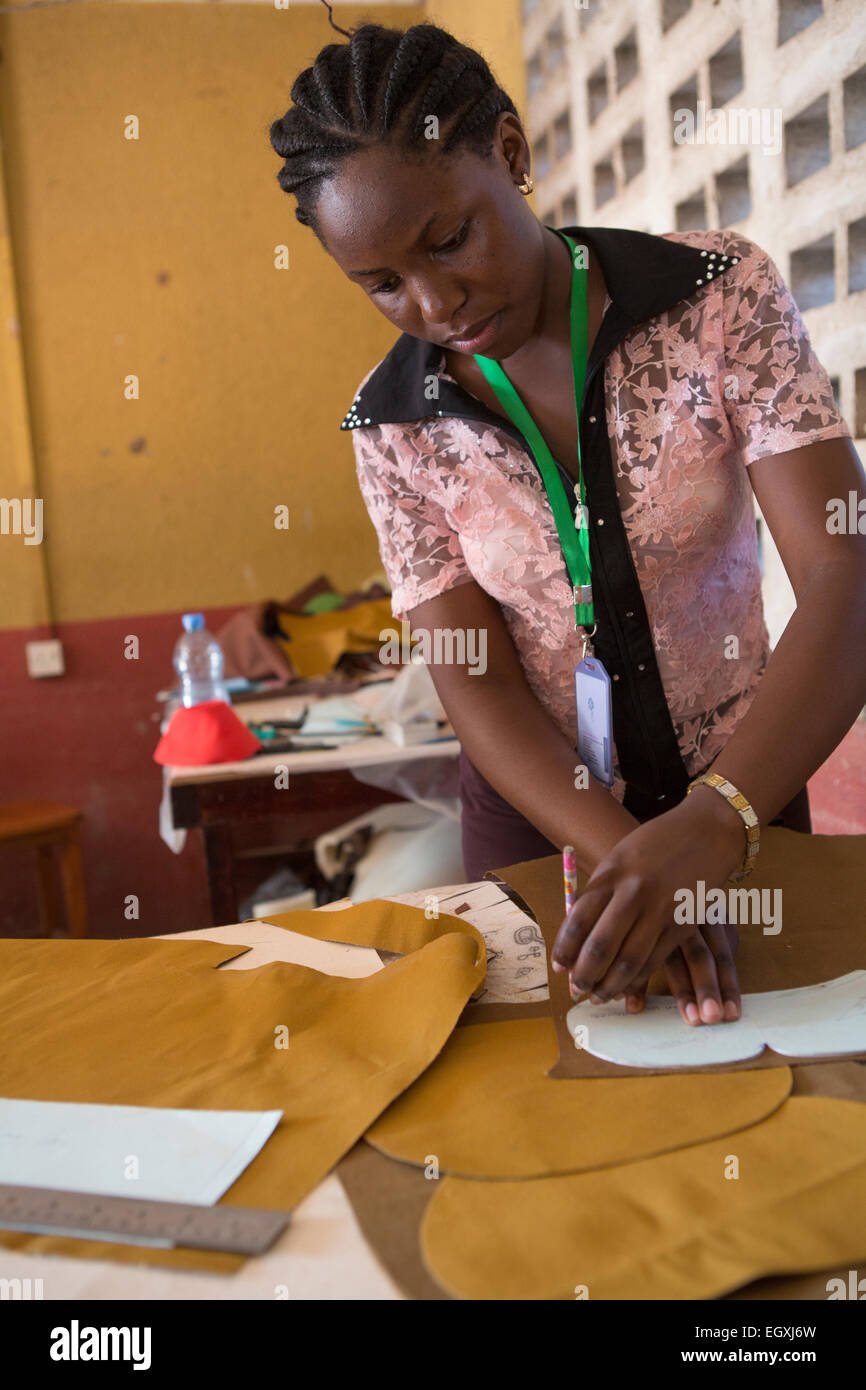 Artisans design hand-made bags in a workshop in Dar es Salaam, Tanzania, East Africa. Stock Photo