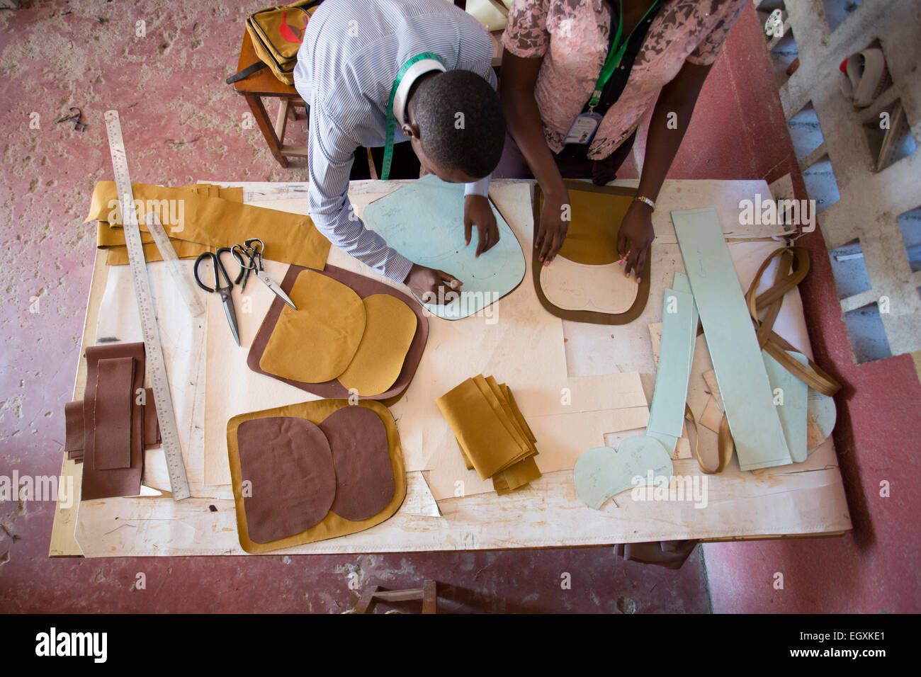Artisans design hand-made bags in a workshop in Dar es Salaam, Tanzania, East Africa. Stock Photo