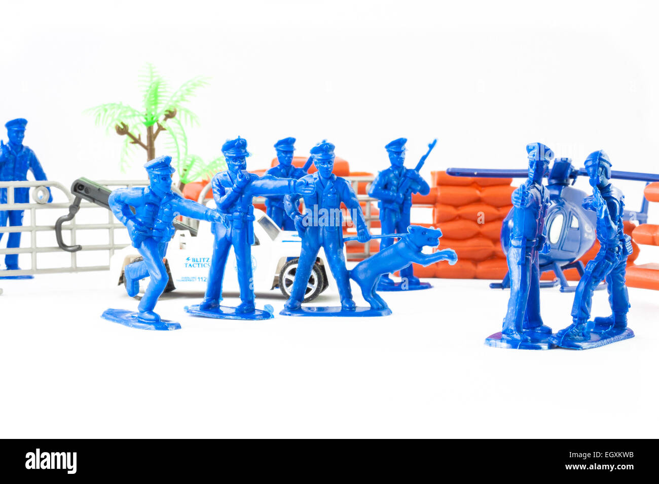 Little toys cop. Elicopter, policeman and policedog Stock Photo Alamy