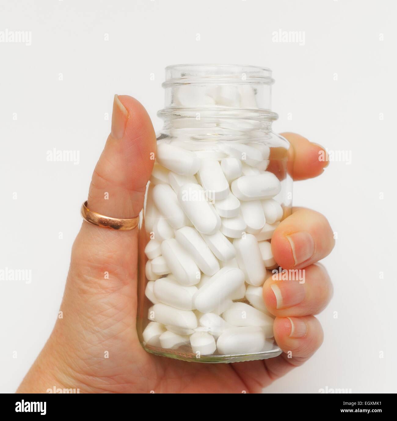 A glass jar full tablets Stock Photo Alamy