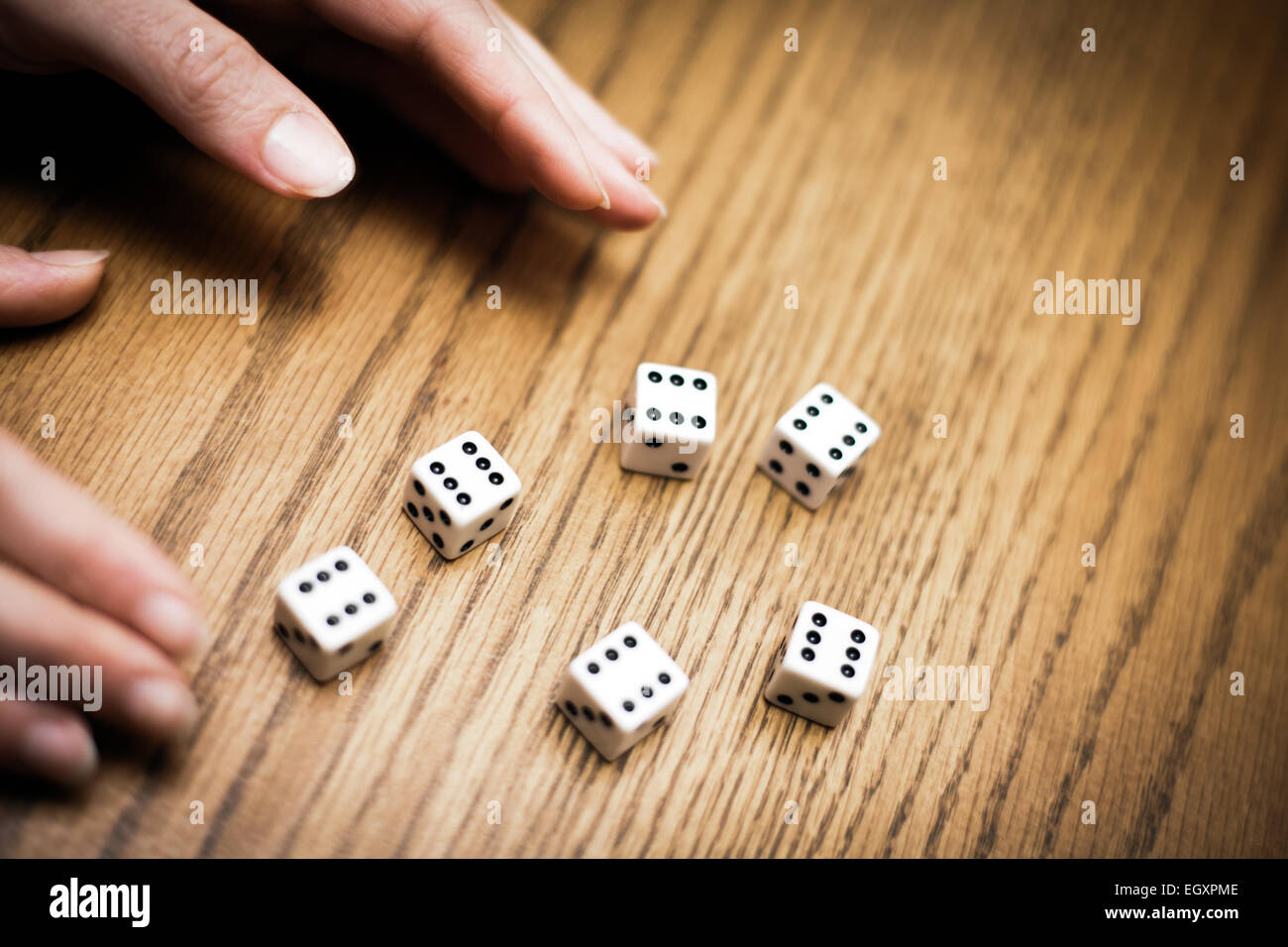 Throwing six dice and getting a perfect score ! - Luck concept. Stock Photo