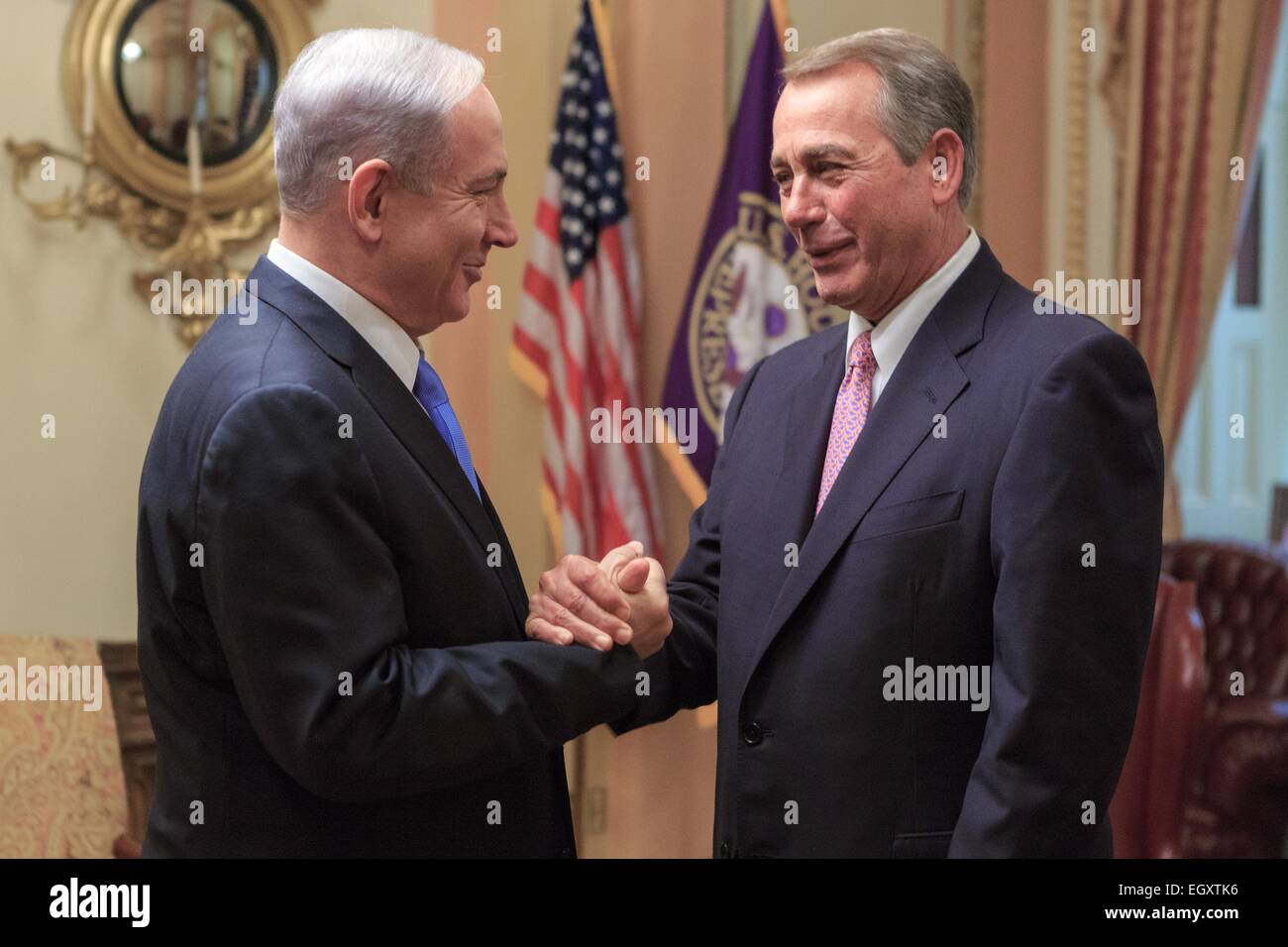 US Speaker of the House John Boehner welcomes Israeli Prime Minister Benjamin Netanyahu before his third addresses to a joint session of Congress March 3, 2015 in Washington, DC. Netanyahu was invited by the Republican majority against usual protocol and railed against a possible Iranian nuclear deal currently being negotiated by U.S. Secretary of State John Kerry. Stock Photo
