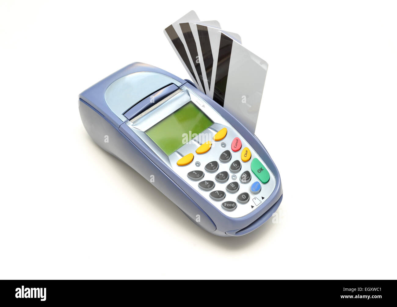 Portable Eftpos credit card machine with multiple blank credit cards in the swiping slot. Stock Photo