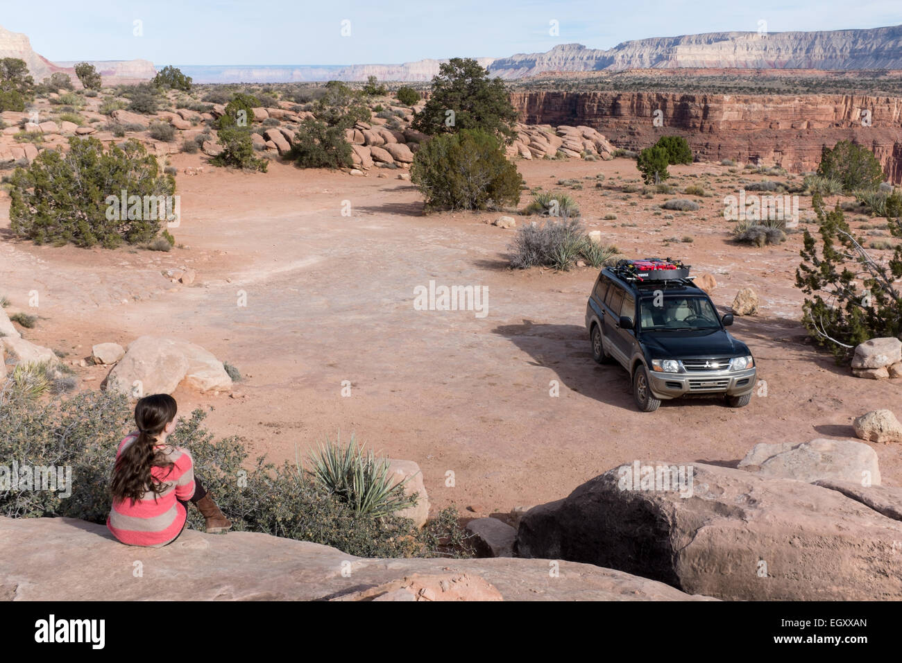 Teenage girl and truck at Totoweep Tuweep overlook, Grand Canyon, AZ, USA Stock Photo
