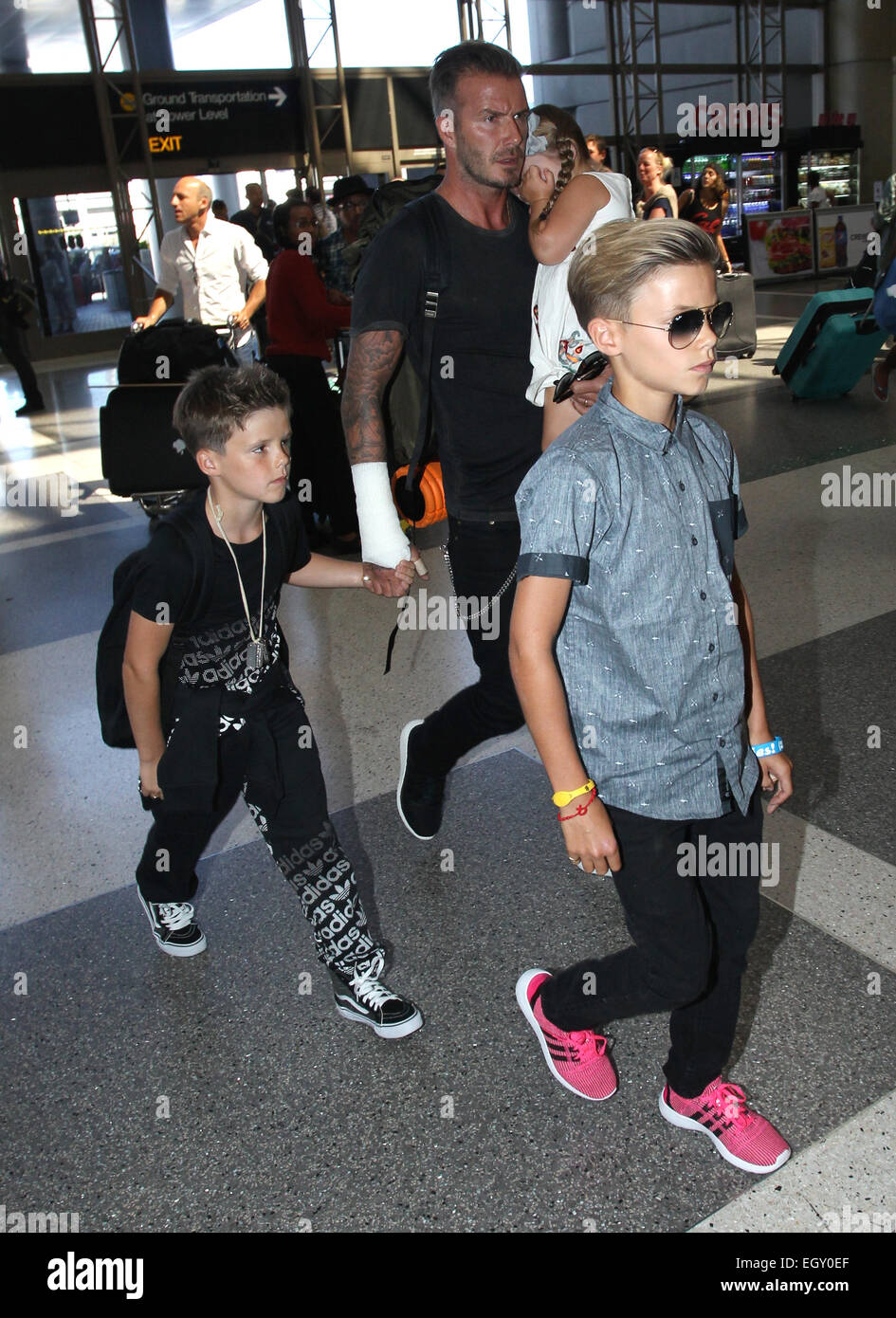 David beckham arrives lax airport hi-res stock photography and