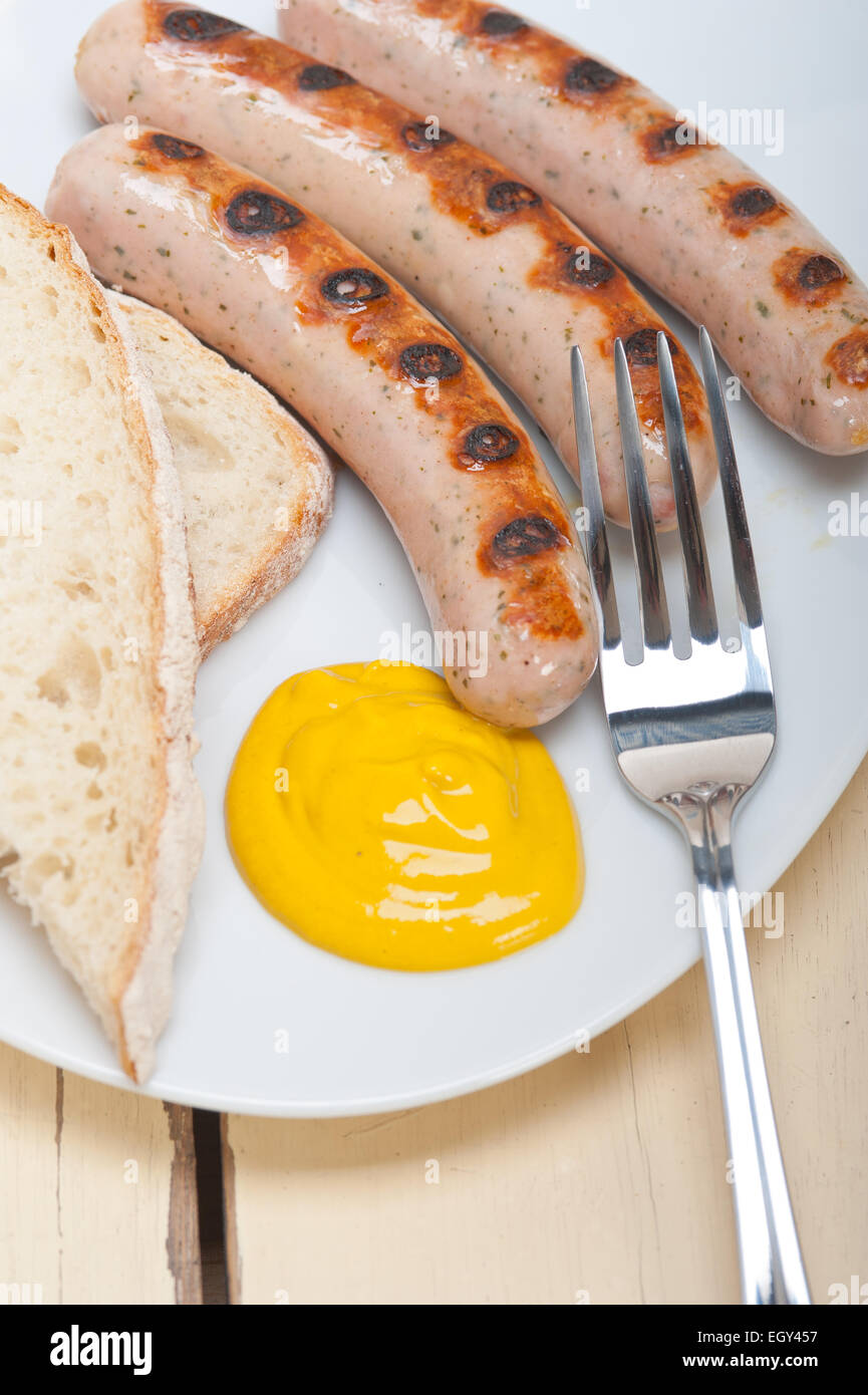 traditional fresh German wurstel sausages grilled with yellow mustard Stock Photo Alamy