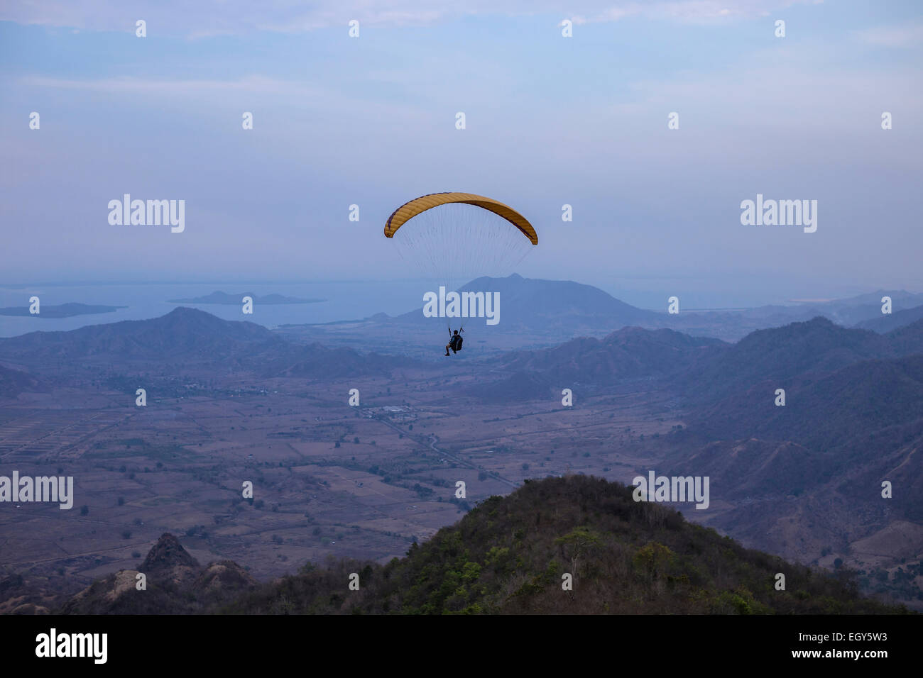 Paragliding in Indonesia, West Sumabawa. Stock Photo