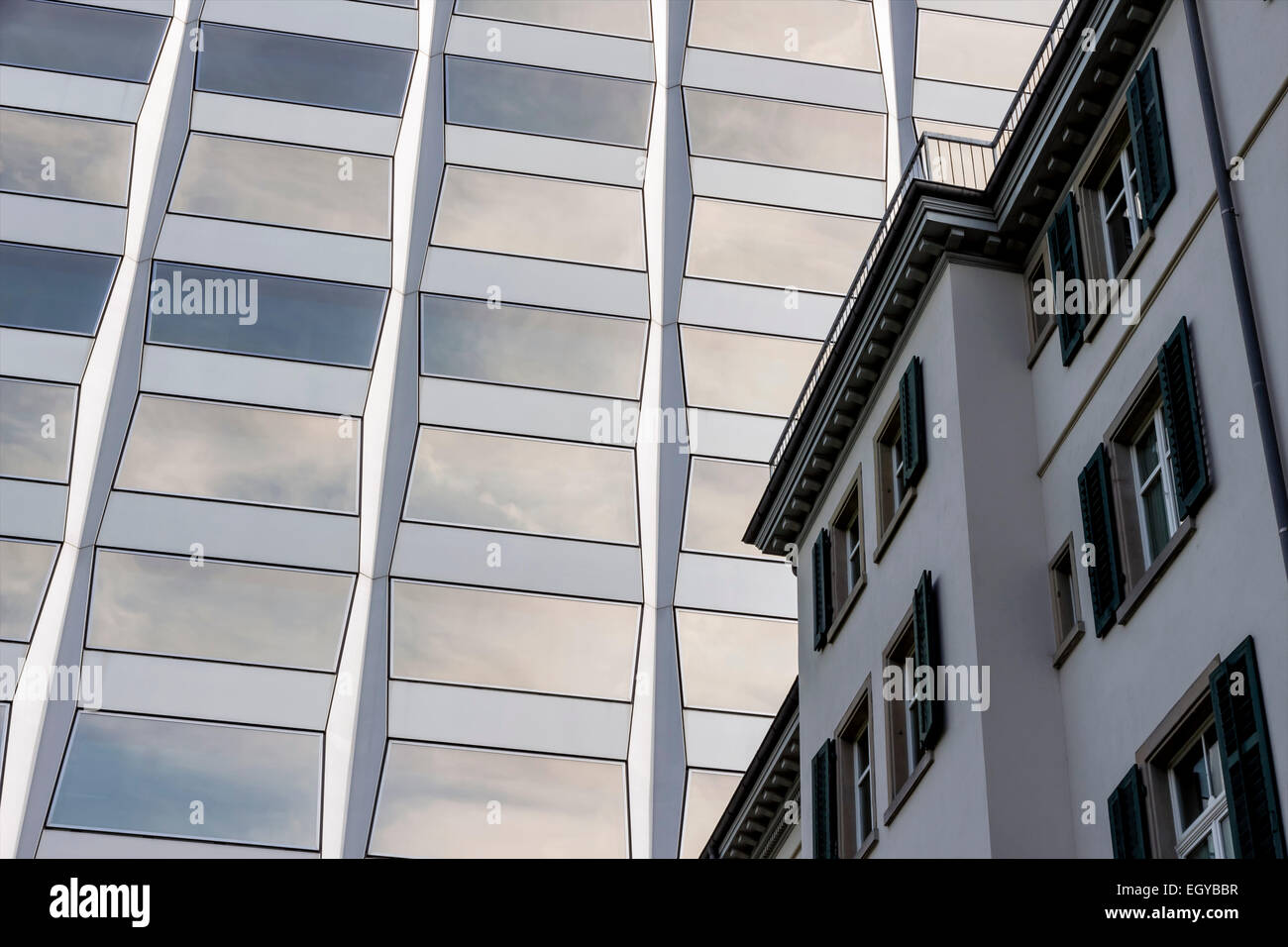 Switzerland, Zurich, facade of an old building and an office tower Stock Photo