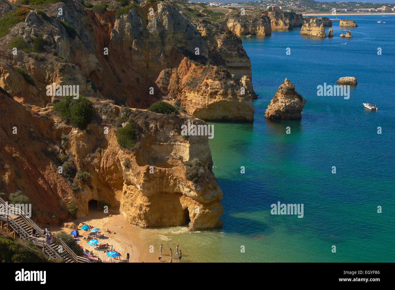Rocky coastline, Praia do Camilo, Camilo Beach, Lagos, Algarve, Portugal Stock Photo