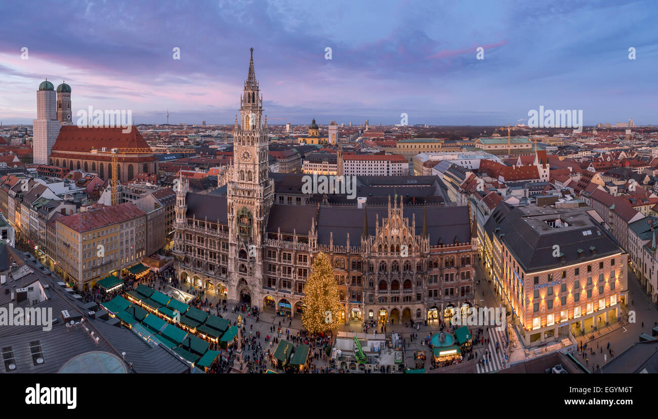 Germany, Munich, Christmas market at townhall square in the evening Stock Photo