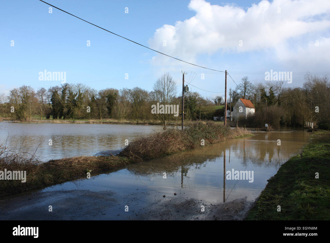 The flooded river at the Codham Mill ford in essex Stock Photo