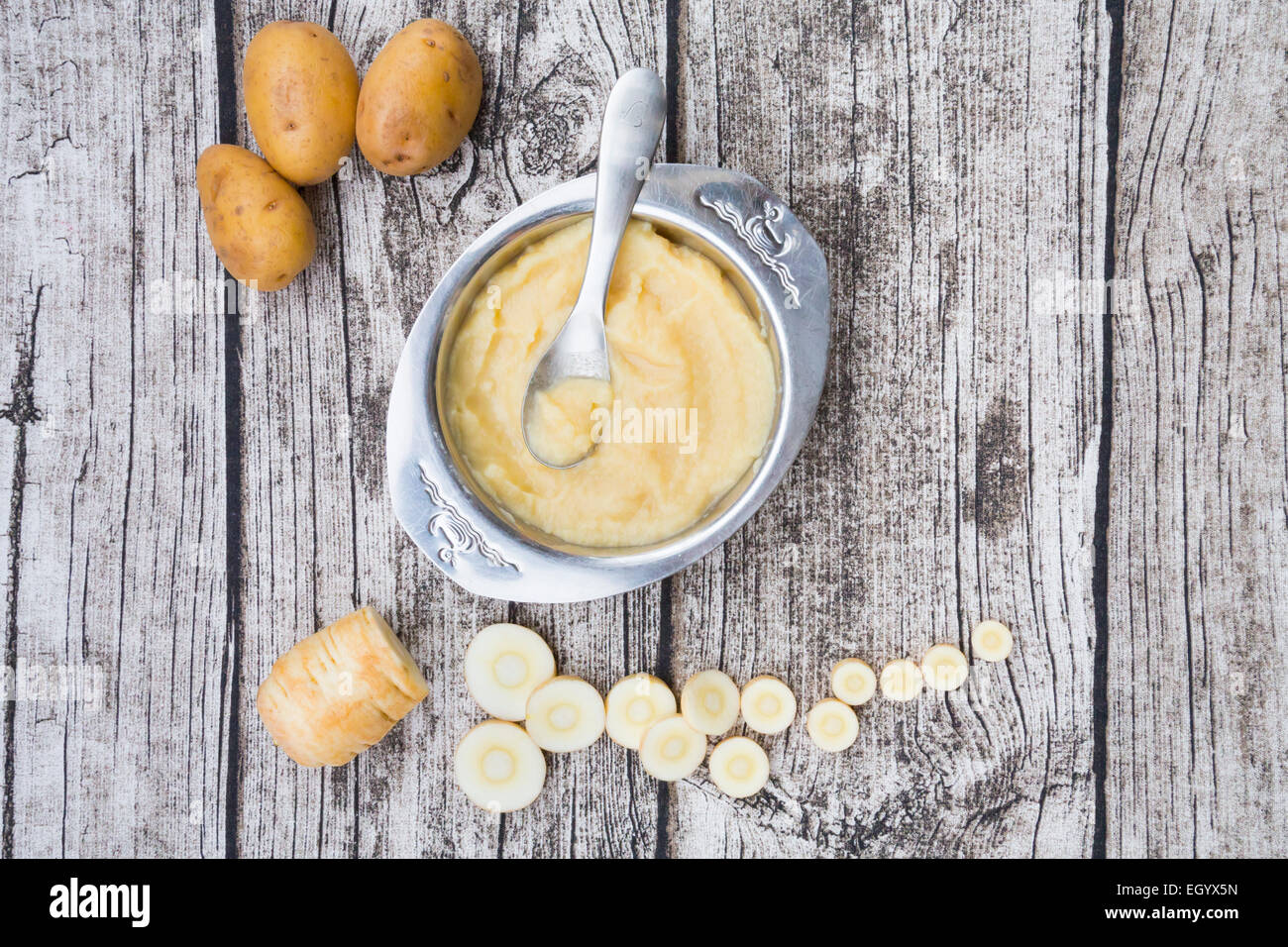 Baby Food Pureed Parsnip On A Spoon Stock Photo - Download Image