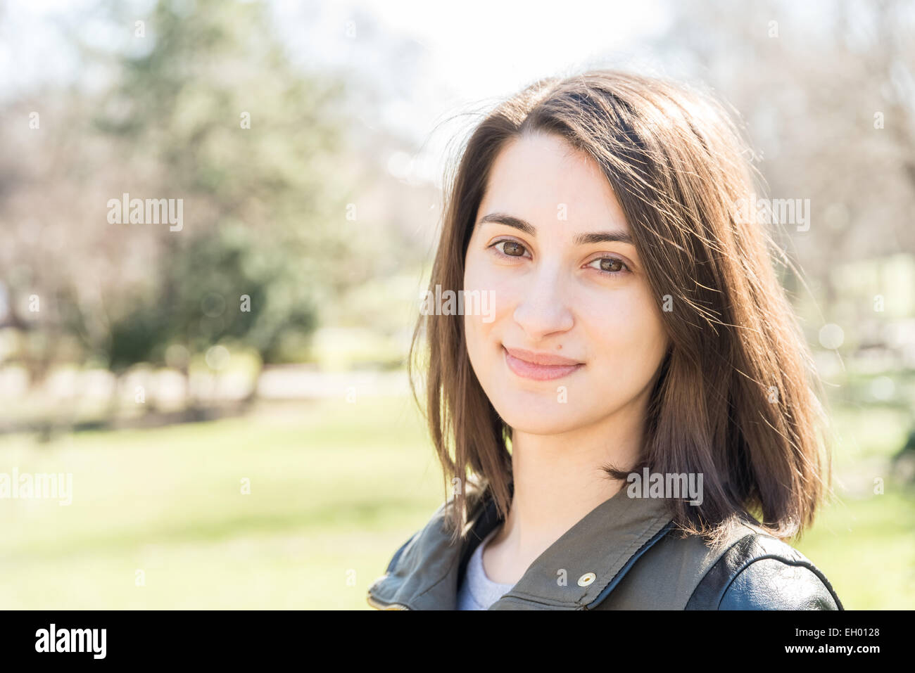 Beautiful Smiling Girl Portrait In Autumn Park Stock Photo - Alamy
