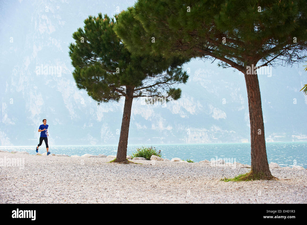 Man running at lake garda hi-res stock photography and images - Alamy
