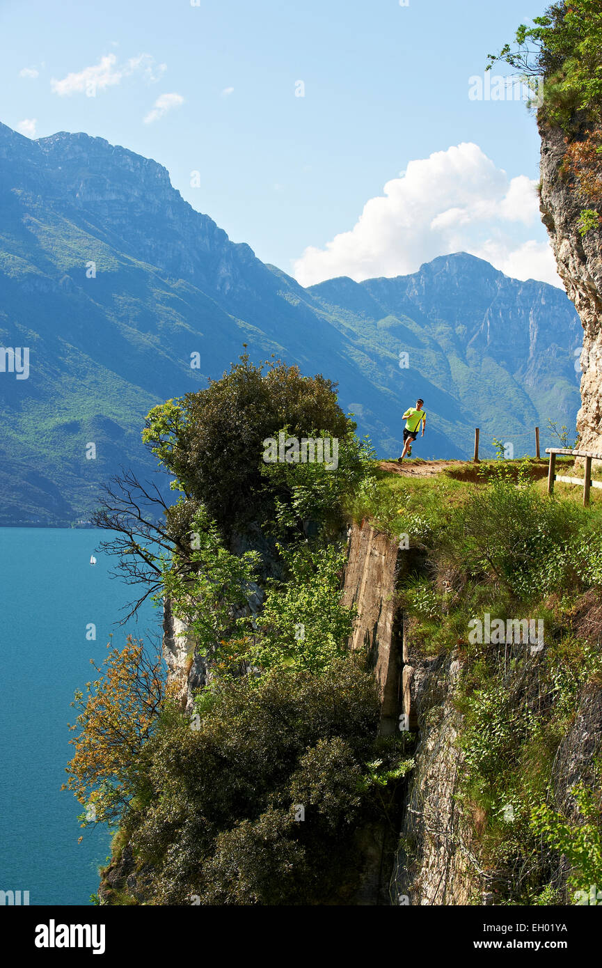 Man running at lake garda hi-res stock photography and images - Alamy