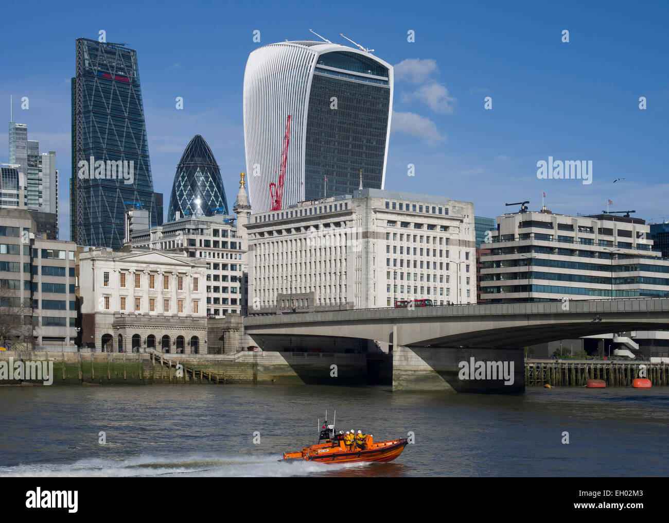 London City skyline with The Walkie Talkie, The Gherkin and The Cheese Grater to the left. type E lifeboat Rib Hulrey Burley the Stock Photo
