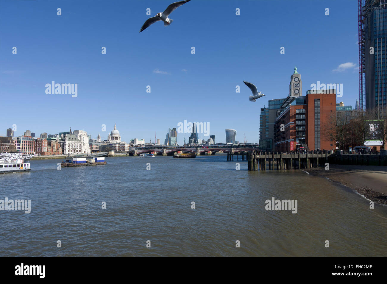 River Thames towards St Pauls with The Cheese Grater and Walkie-Talkie to the right Stock Photo