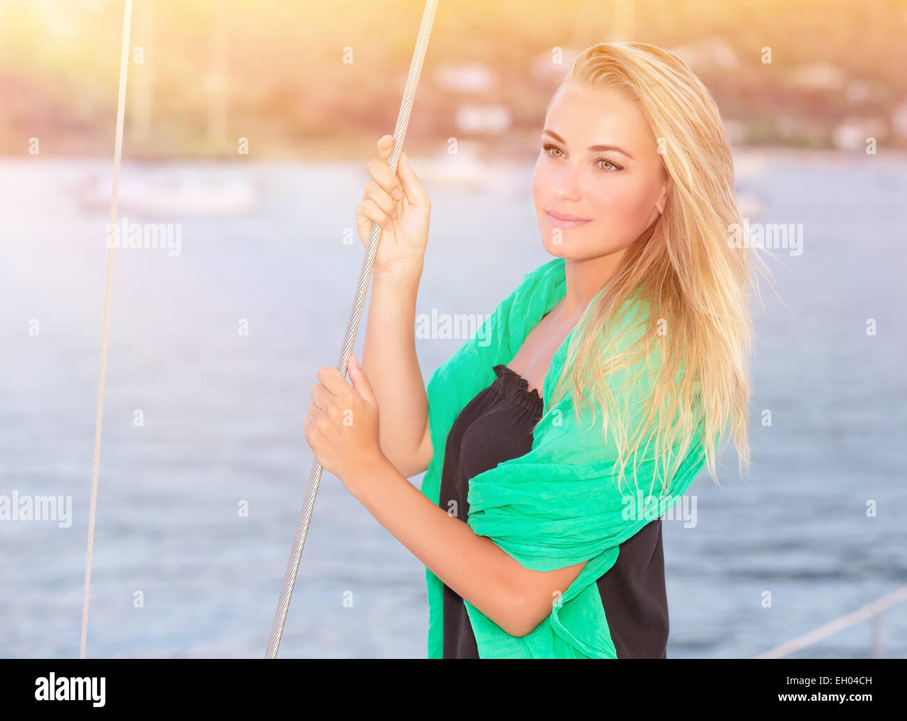 Portrait Of Pretty Dreamy Blond Girl Standing On The Deck Of Luxury 