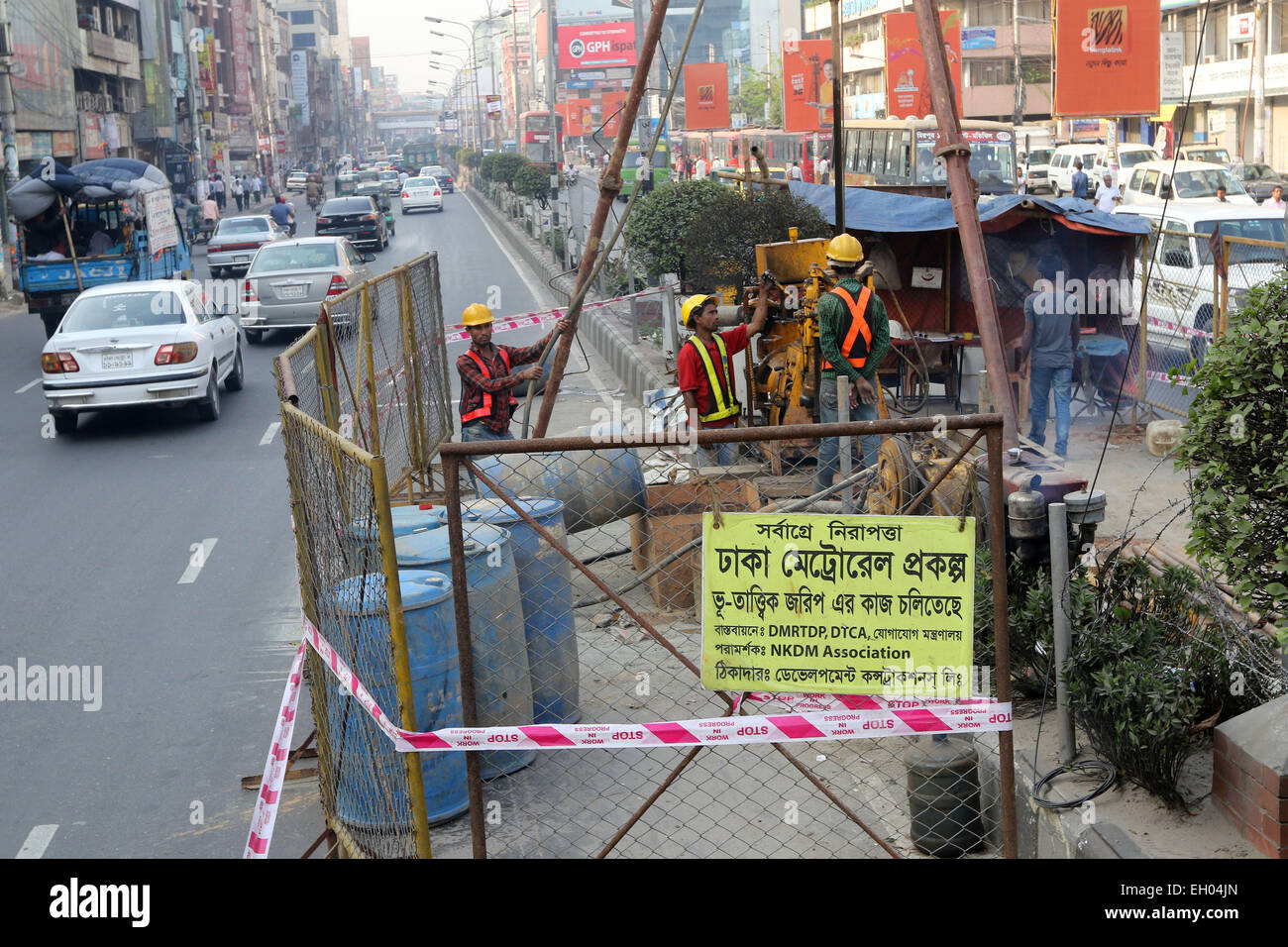 Dhaka, Bangladesh. 4th March, 2015. Metro rail project staff conducting geo-technical survey at Karwan Bazar in Dhaka to determine the nature of the soil. The metro rail is aimed at easing perennial traffic congestion in the capital and providing an improved, faster and comfortable means of public transportation. Stock Photo