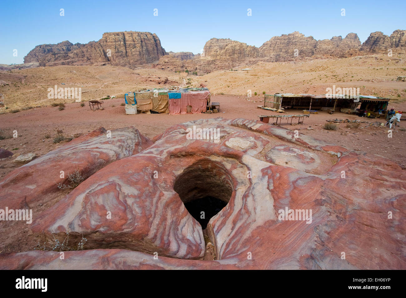 A water well in the ground in Petra in Jordan Stock Photo