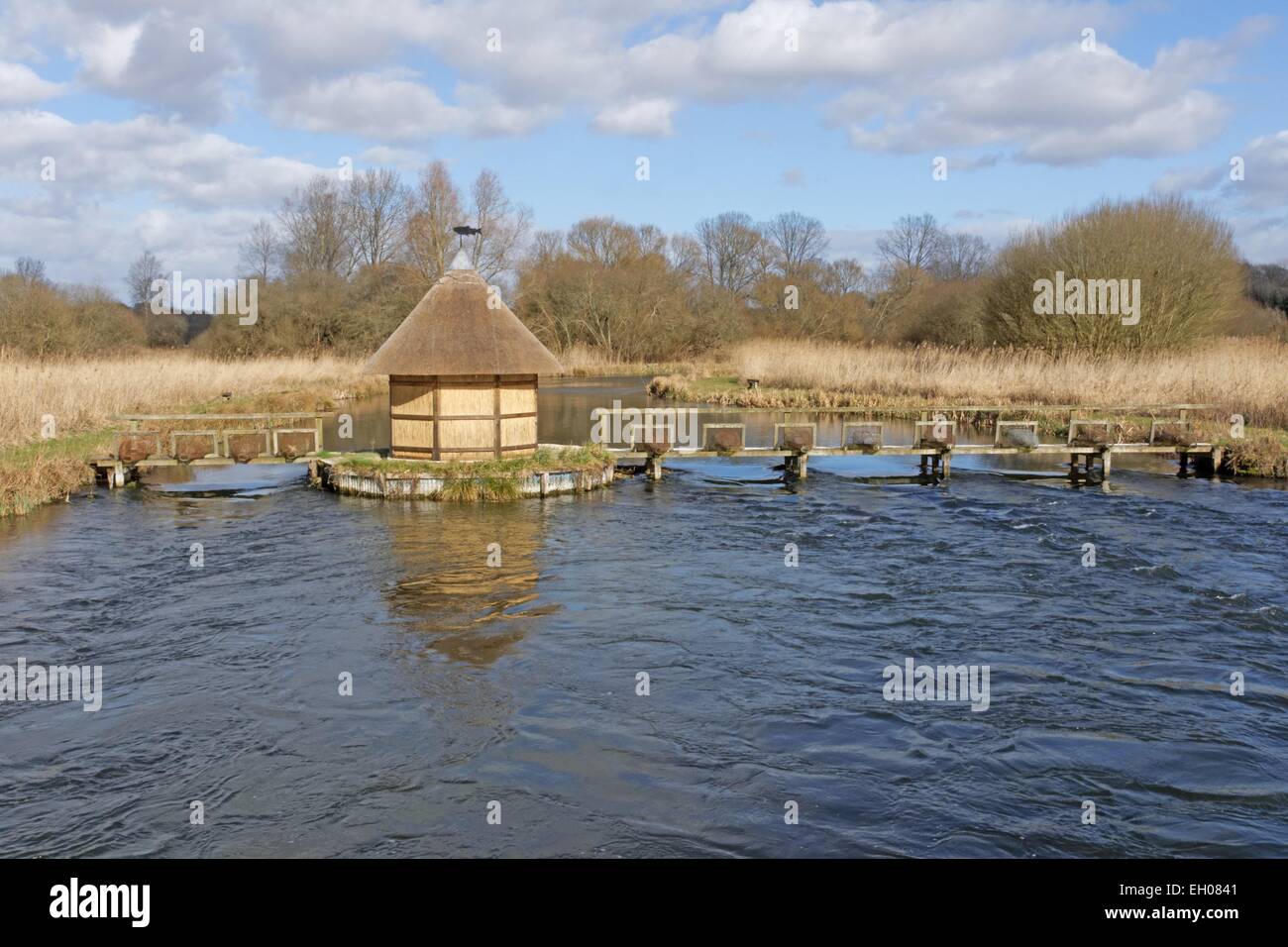 Fishermans hut and eel traps on River Test Stock Photo Alamy