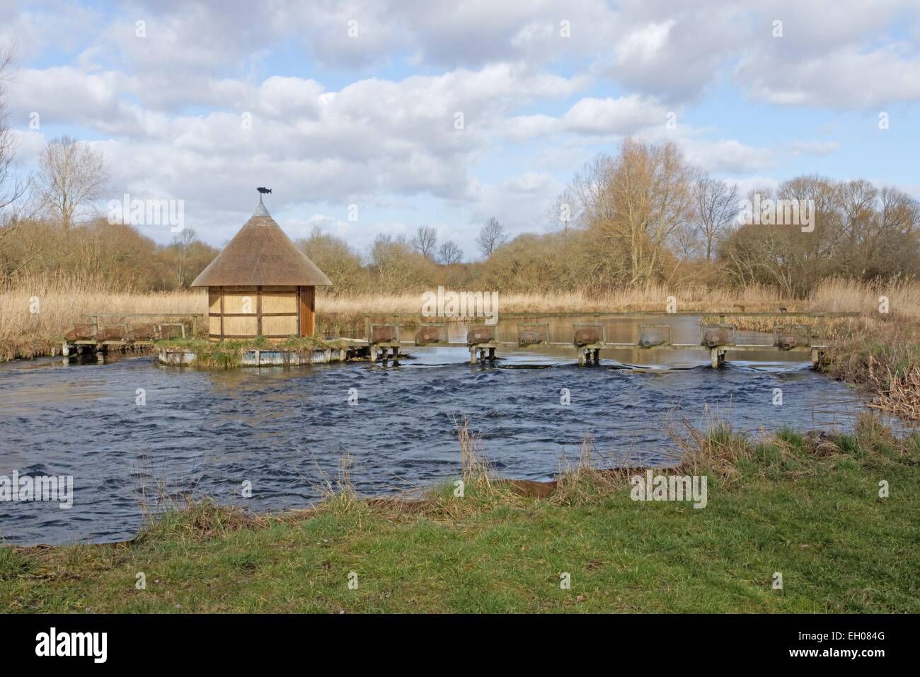Fishermans hut and eel traps on River Test . Stock Photo