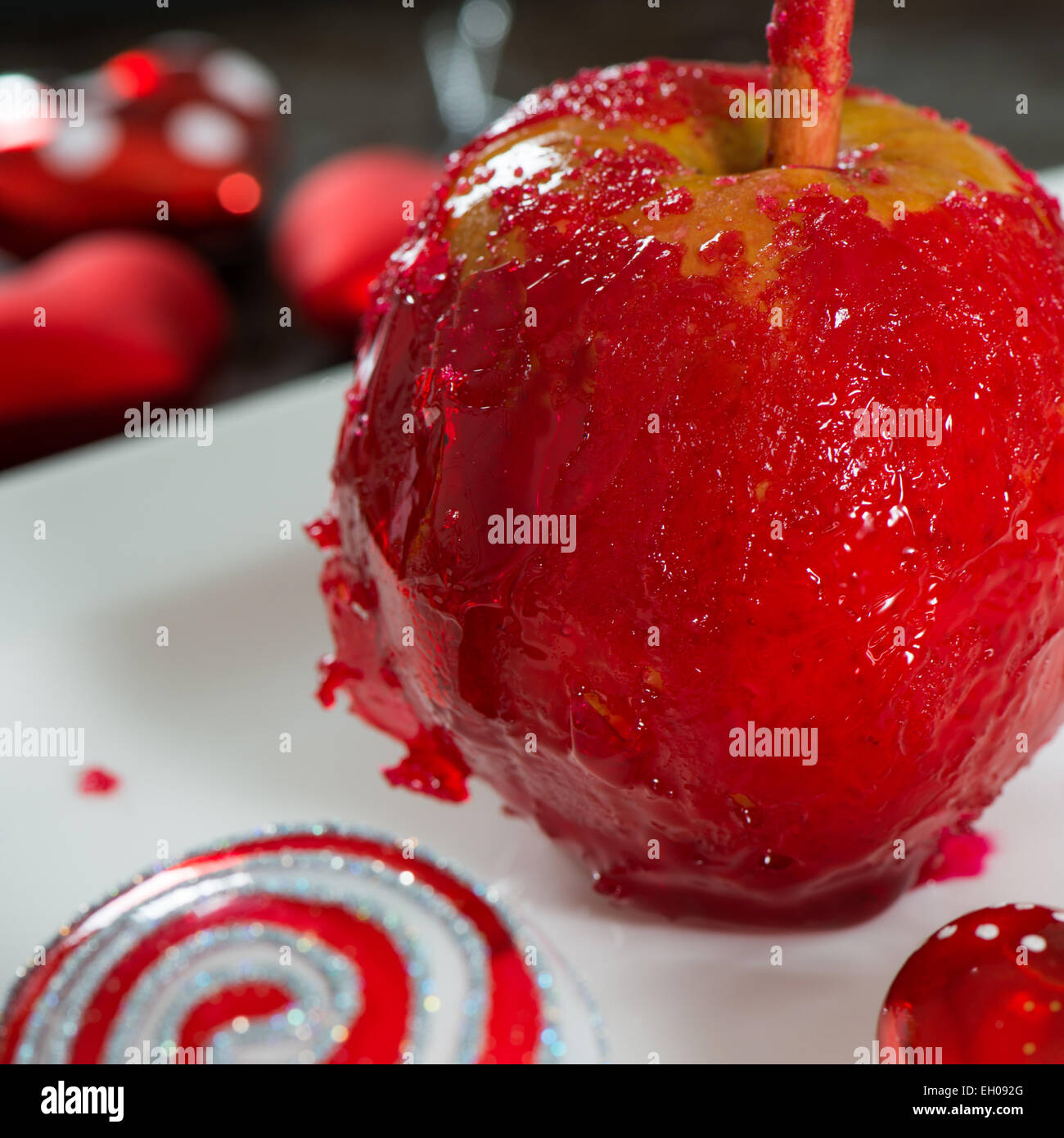 Candied apple with decoration on a plate Stock Photo - Alamy