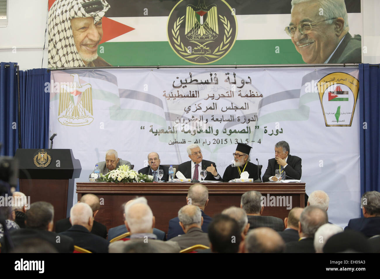 (150305) -- RAMALLAH, March 5, 2015 (Xinhua) -- Palestinian President Mahmoud Abbas (C-back) speaks during the meeting of the Central Council of Palestine Liberation Organization (PLO) in the West Bank city of Ramallah, Mar. 4, 2015. Abbas called on the PLO Central Council to reconsider the functions of the Palestinian National Authority (PNA) on Wednesday. (Xinhua/Fadi Arouri) (zjy) Stock Photo