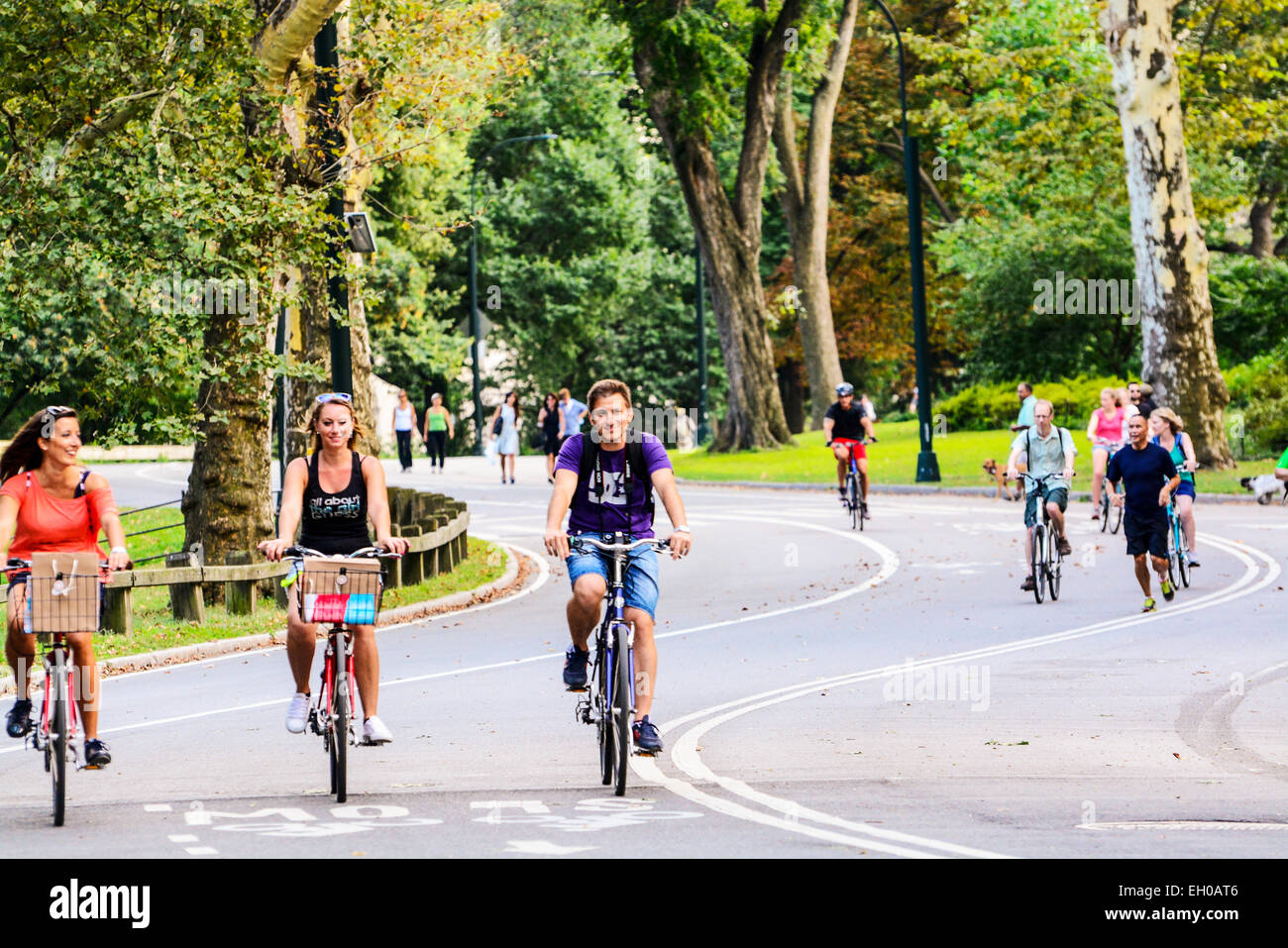 Bicycling and running in Central Park, Manhattan, New York City, USA Stock Photo
