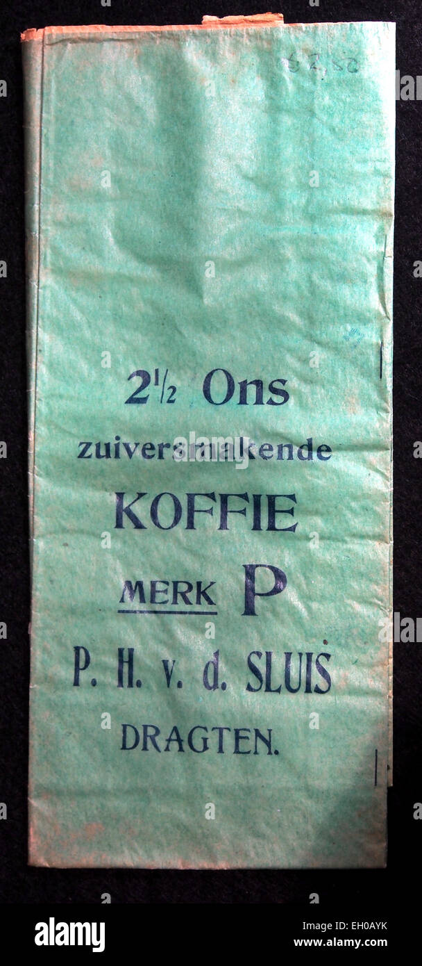 A vintage coffee bag labeled '2,5 ons Koffiezakje Merk P' from PH vd Sluis, Dragten. The bag was used for packaging coffee, a common product from the Dutch coffee industry during the mid-20th century. Stock Photo