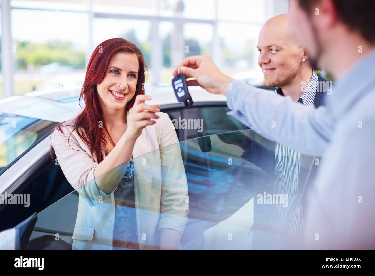 Car dealer giving key hi-res stock photography and images - Alamy