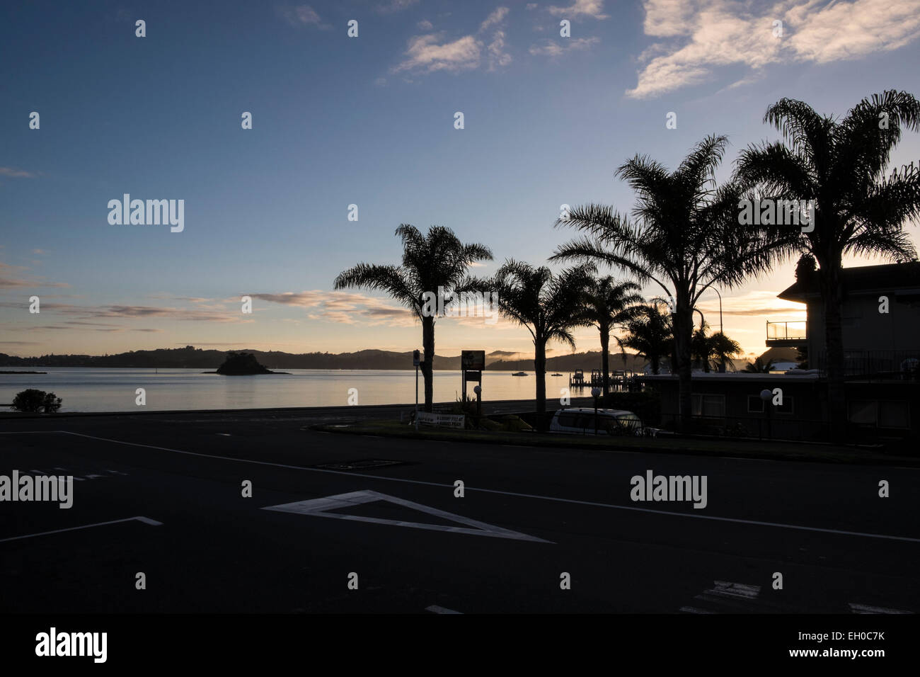 Sunrise over palm trees hi-res stock photography and images - Alamy