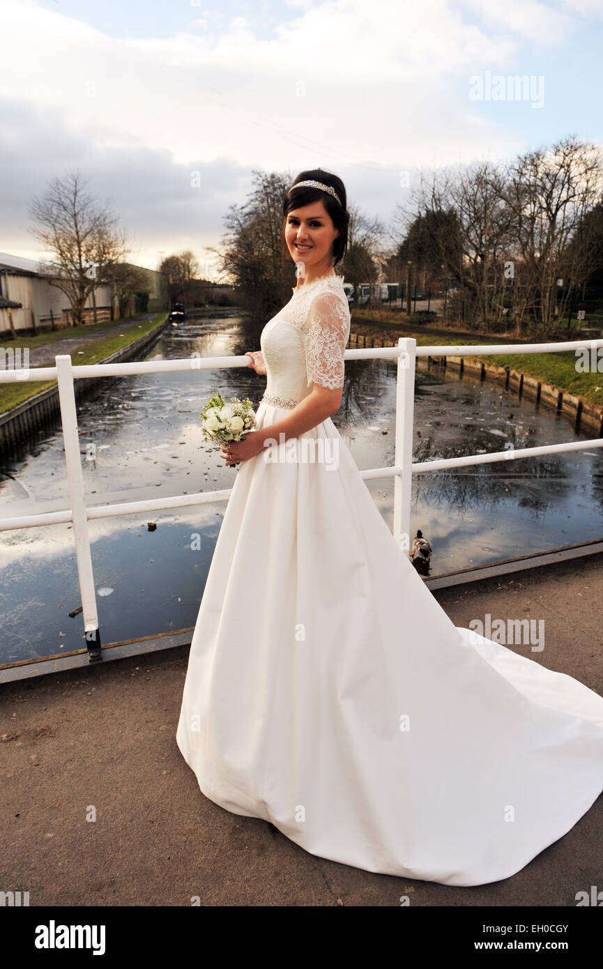 Bride ready for her big day outside near Skipton canal. MODEL RELEASED Stock Photo
