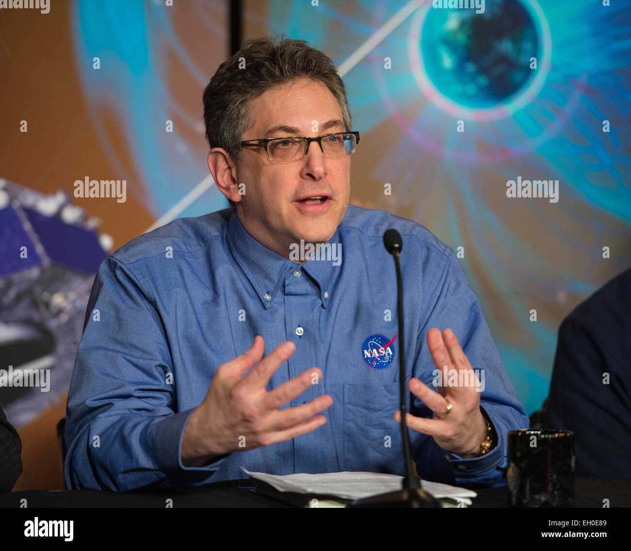 Jeff Newmark, interim director, Heliophysics Division, NASA Headquarters speaks during a briefing about the upcoming launch of the Magnetospheric Multiscale (MMS) mission, Wednesday, February 25, 2015, at NASA Headquarters in Washington DC. The mission is scheduled for a March 12 launch from Cape Canaveral Air Force Station in Florida, and will help scientists understand the process of magnetic reconnection in the atmosphere of the sun and other stars, in the vicinity of black holes and neutron stars, and at the boundary between our solar system’s heliosphere and interstellar space. The missio Stock Photo