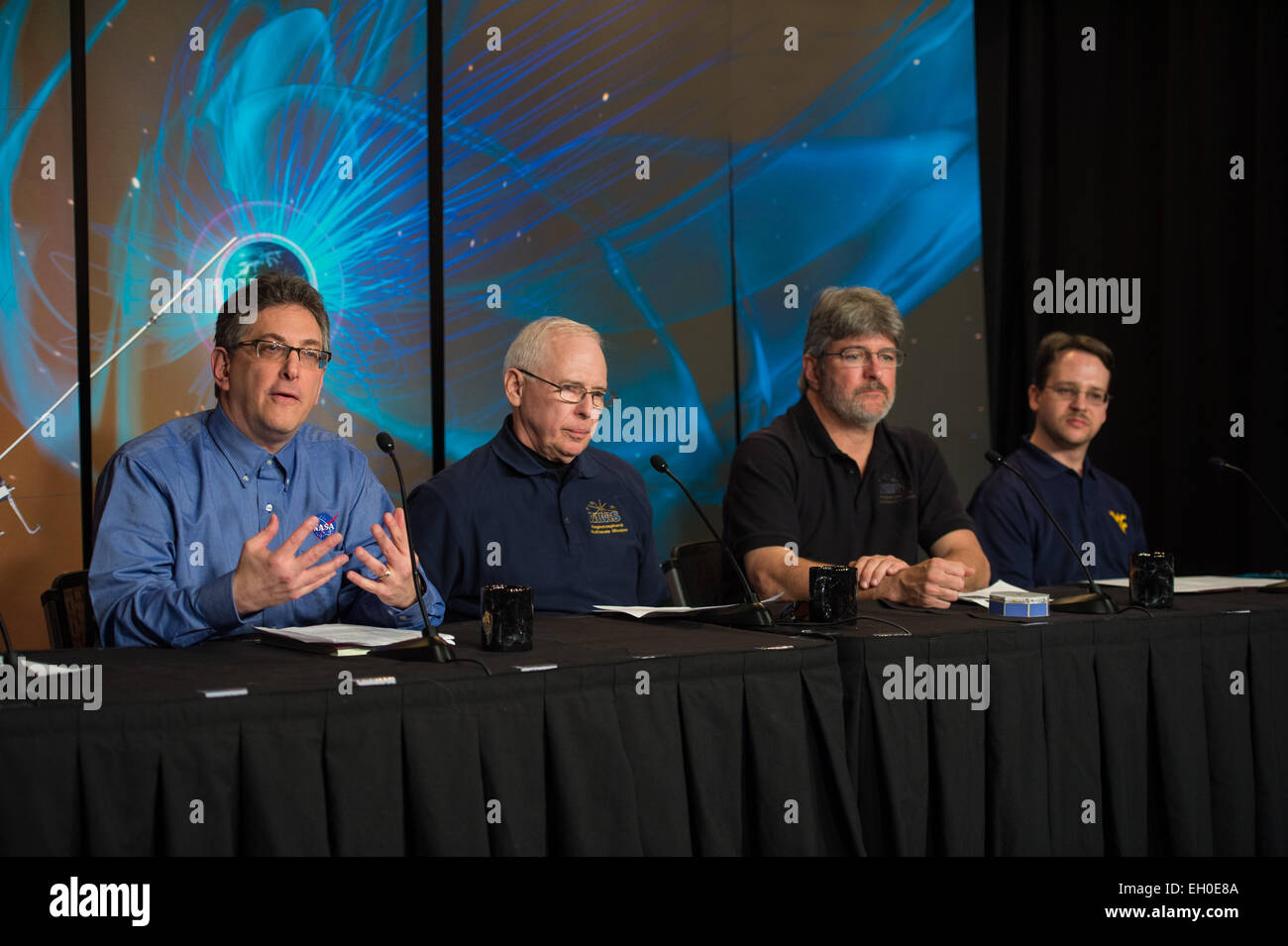 Jeff Newmark, interim director, Heliophysics Division, NASA Headquarters, left, Jim Burch, principal investigator, MMS Instrument Suite, Southwest Research Institute, second from left, Craig Tooley, MMS project manager, NASA’s Goddard Space Flight Center, second from right, and Paul Cassak, associate professor, West Virginia University, right, are seen during a briefing about the upcoming launch of the Magnetospheric Multiscale (MMS) mission, Wednesday, February 25, 2015, at NASA Headquarters in Washington DC. The mission is scheduled for a March 12 launch from Cape Canaveral Air Force Station Stock Photo
