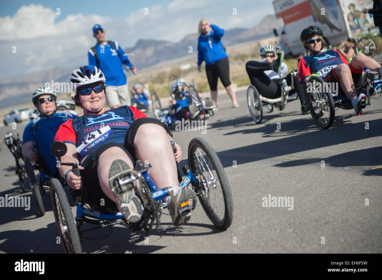 Participants in the 2015 Air Force Wounded Warrior Trials woman's recumbent race prepare to start at Nellis Air Force Base, Nev. Feb. 28, 2015. The recumbent race is one of the three cycling events the warrior athletes competed in. The Air Force Trials are an adaptive sports event designed to promote the mental and physical well-being of seriously ill and injured military members and veterans. More than 105 wounded, ill or injured service men and women from around the country will compete for a spot on the 2015 U.S. Air Force Wounded Warrior Team which will represent the Air Force at adaptive Stock Photo