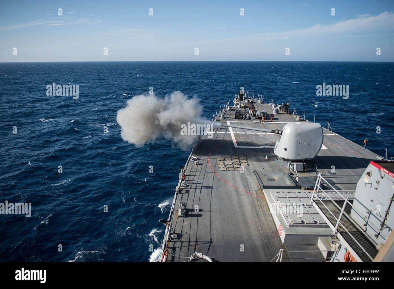 EDITERRANEAN SEA (Feb. 26, 2015) The guided-missile destroyer USS Donald Cook (DDG 75) conducts a live-fire gunnery exercise with the MK 45 5-inch gun as part of a passing exercise with the French navy frigate La Fayette (F 710). Donald Cook is forward-deployed to Rota, Spain, and is conducting naval operations in the U.S. 6th Fleet area of responsibility in support of U.S. national security interests in Europe. Stock Photo