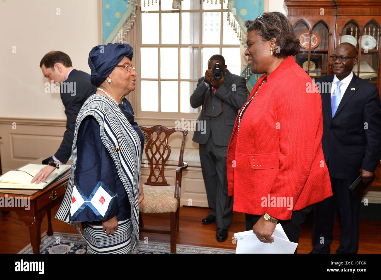 Assistant Secretary of State for African Affairs Linda Thomas-Greenfield greets Liberian President Ellen Johnson Sirleaf before her meeting with U.S. Secretary of State John Kerry at the U.S. Department of State in Washington, D.C., on February 27, 2015. Stock Photo