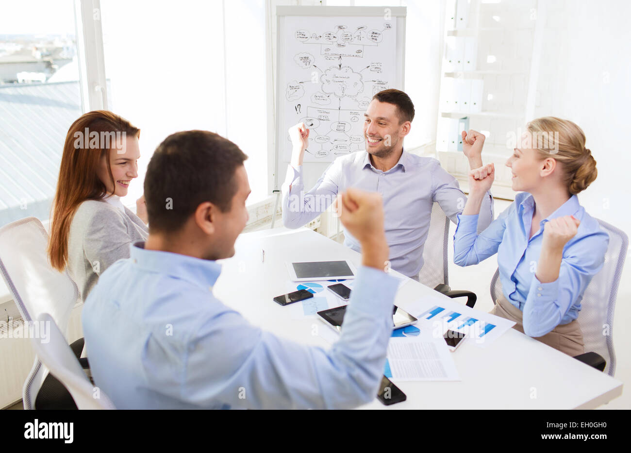 smiling business people meeting in office Stock Photo - Alamy