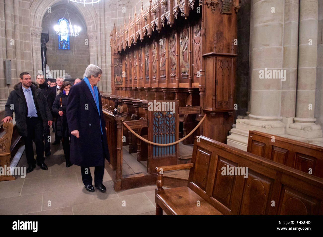U.S. Secretary of State John Kerry looks out at benches in St. Pierre Cathedral in Geneva, Switzerland, the adopted home church of Protestant Reformation leader John Calvin, during a tour on January 26, 2015. Stock Photo