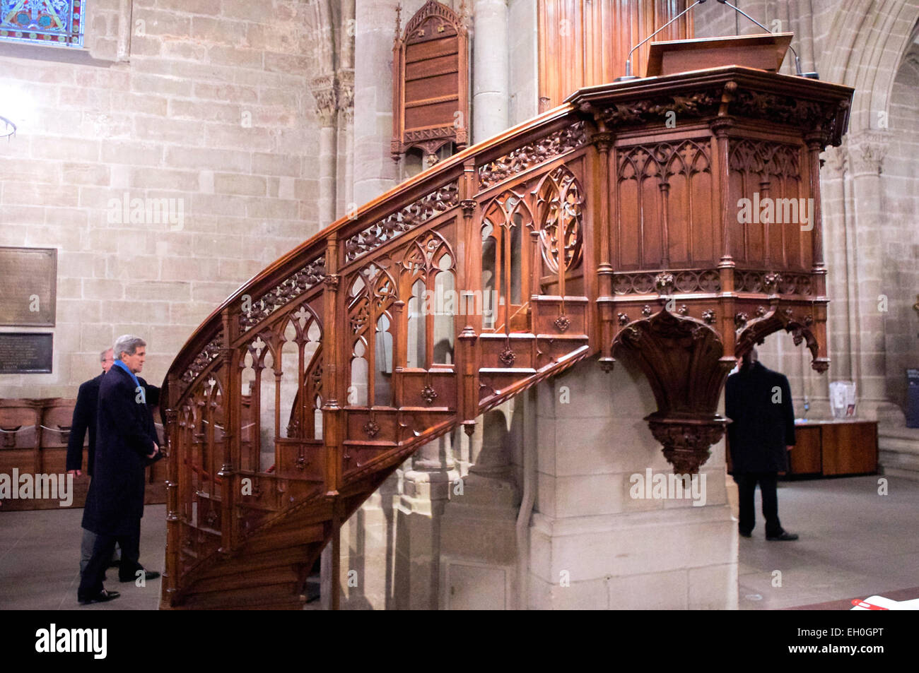 U.S. Secretary of State John Kerry passes the spiral pulpit in St. Pierre Cathedral in Geneva, Switzerland – the adopted home church of Protestant Reformation leader John Calvin – during a tour on January 26, 2015. Stock Photo