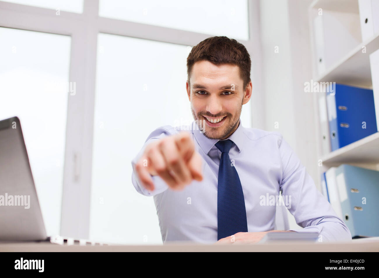 happy businessman pointing on you in office Stock Photo - Alamy