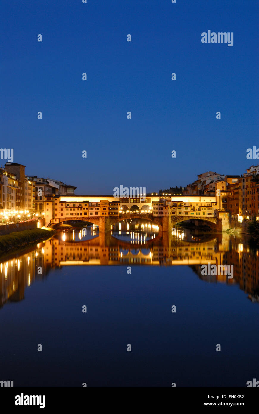 Ponte Vecchio at twilight, a famous bridge across Arno River, Florence, Tuscany, Italy Stock Photo