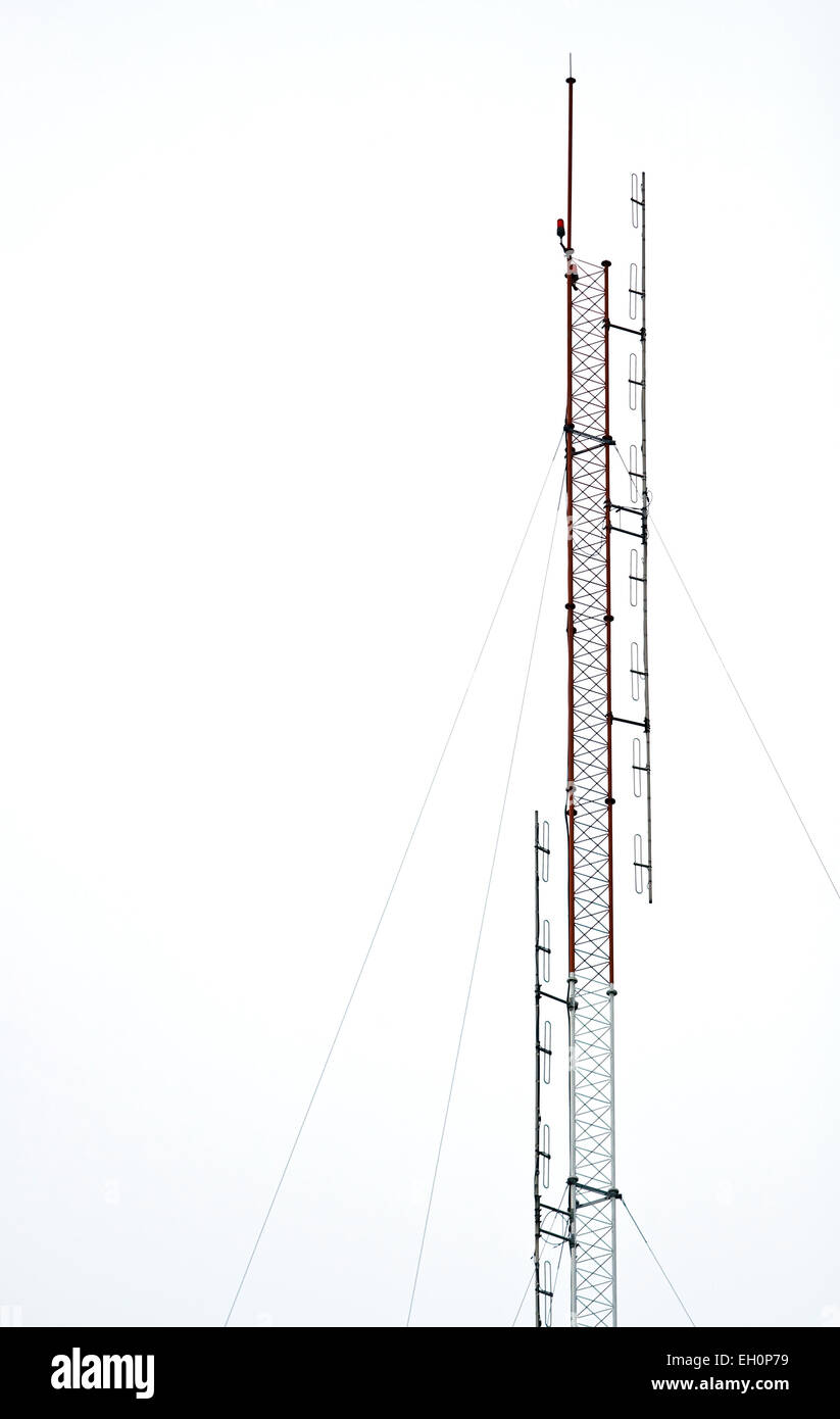 Telecommunication Radio antenna isolated on White sky Stock Photo - Alamy