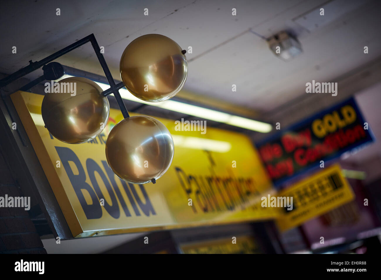 Sign for Harpurhey shopping centre's Bond pawnbrokers shop in North Manchester Stock Photo