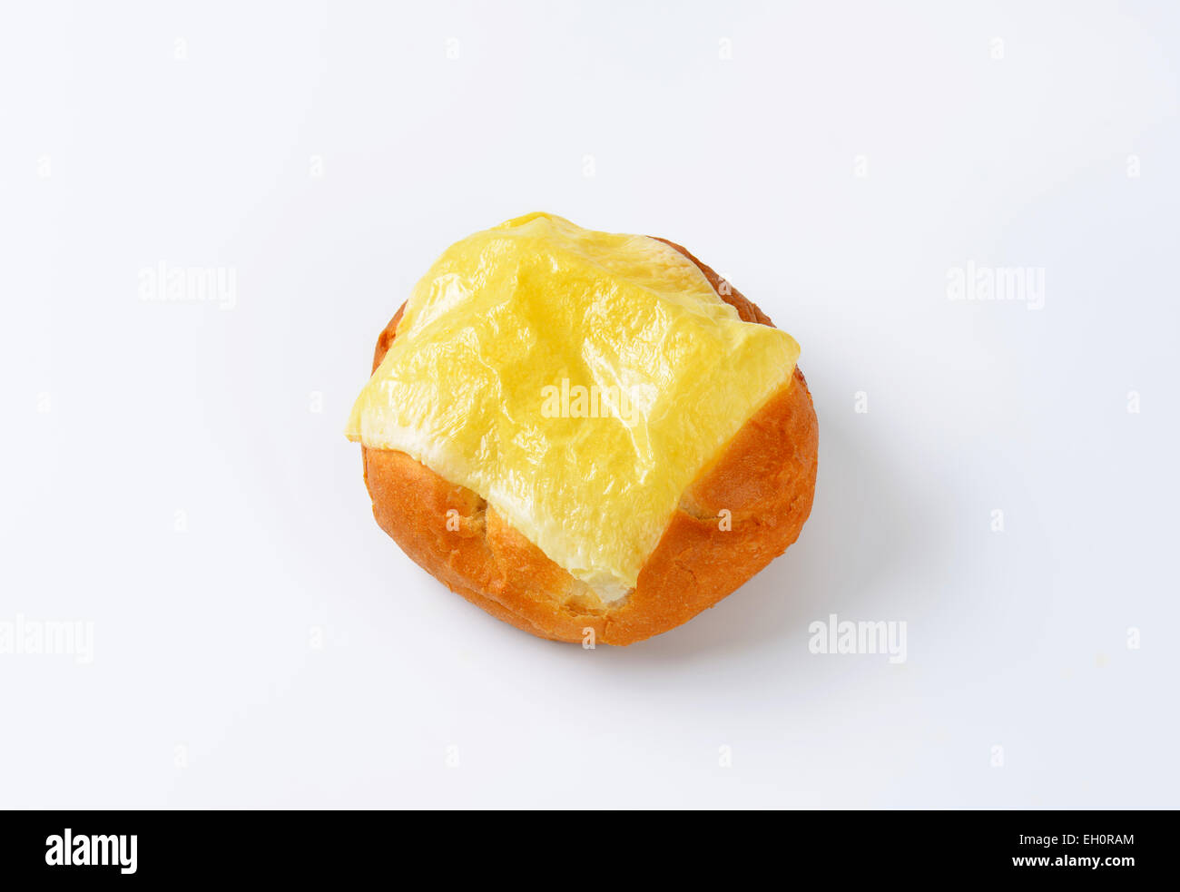 Bread bun with melted cheese on top Stock Photo