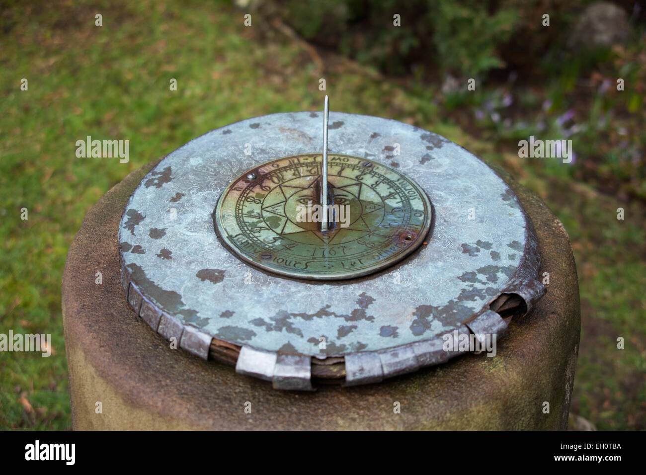 Sundial in the garden Stock Photo Alamy