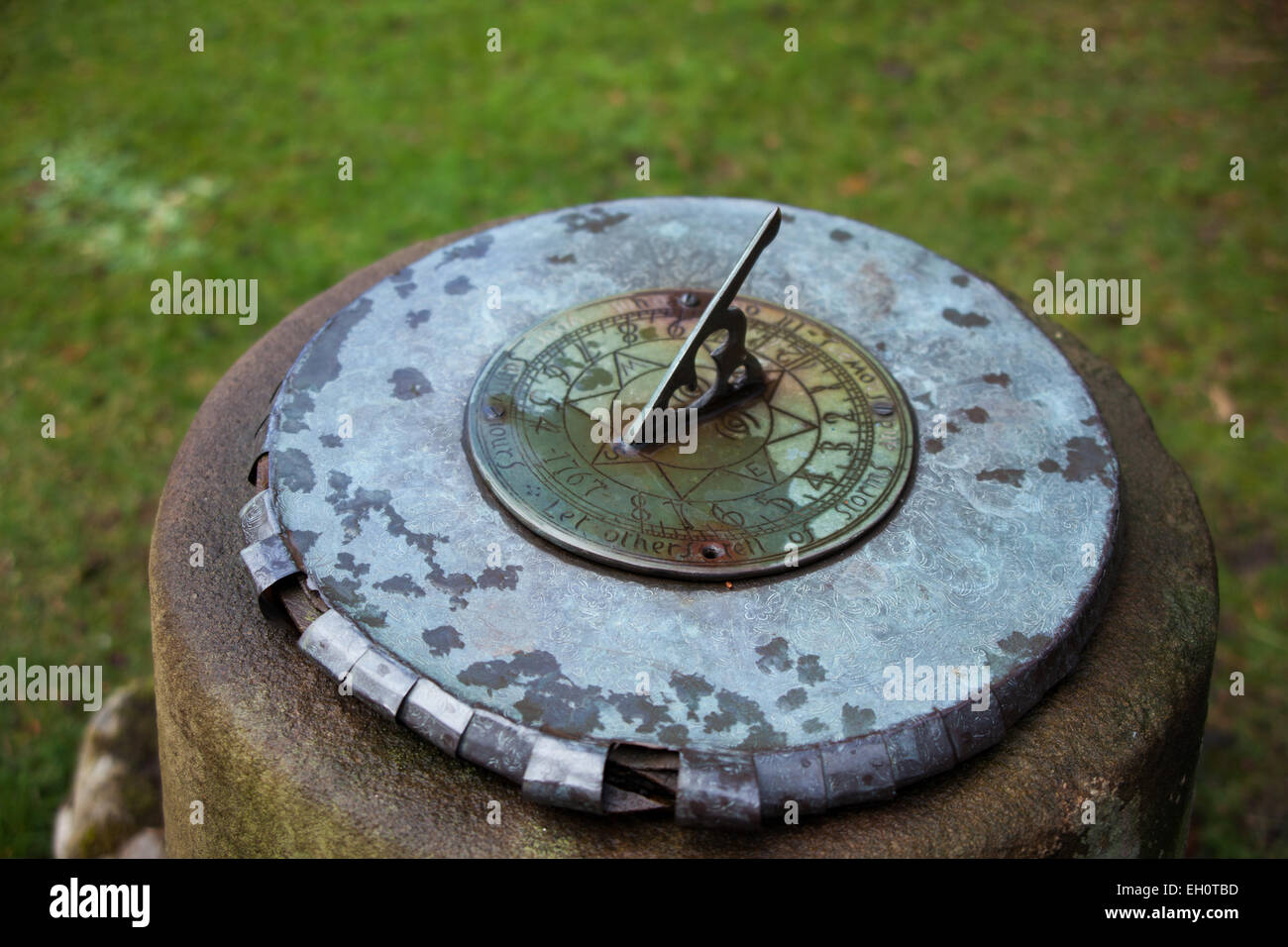 Sundial in the garden Stock Photo Alamy