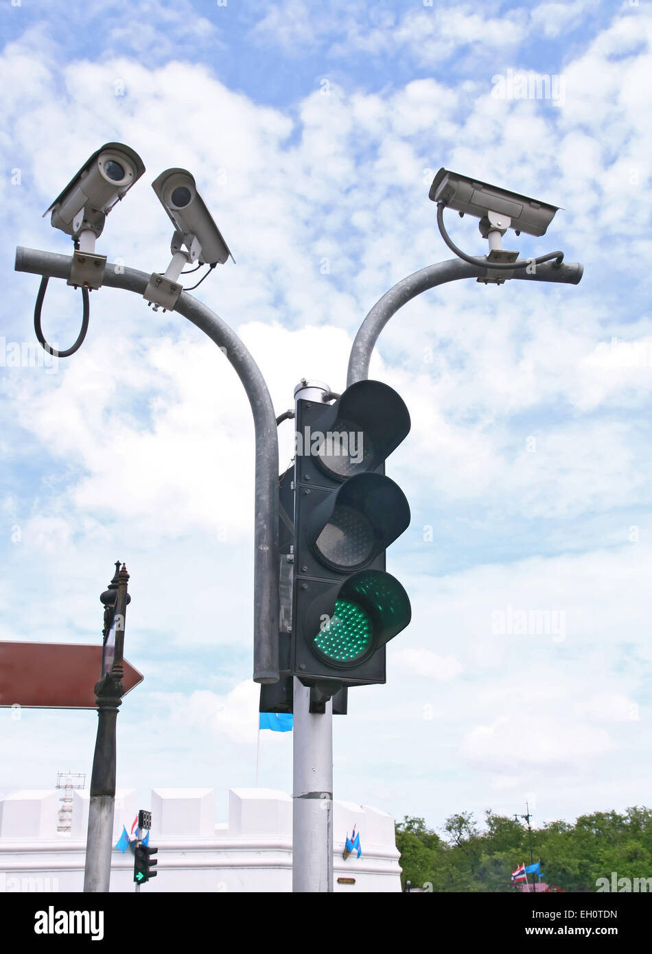 Surveillance Security Camera or CCTV with traffic light Stock Photo Alamy